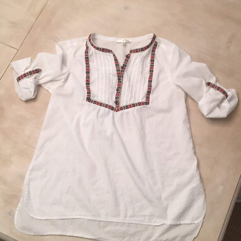 White peasant top with red and navy embroidery